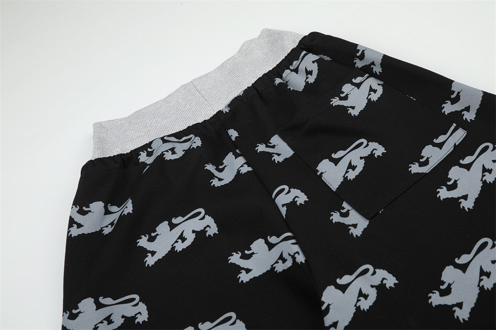 DAXUEN light blue rampant lion graphic jogging pants