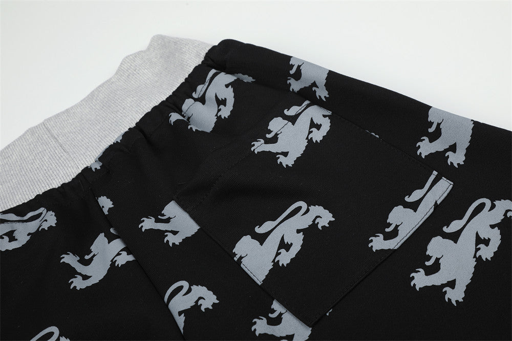 DAXUEN light blue rampant lion graphic jogging pants