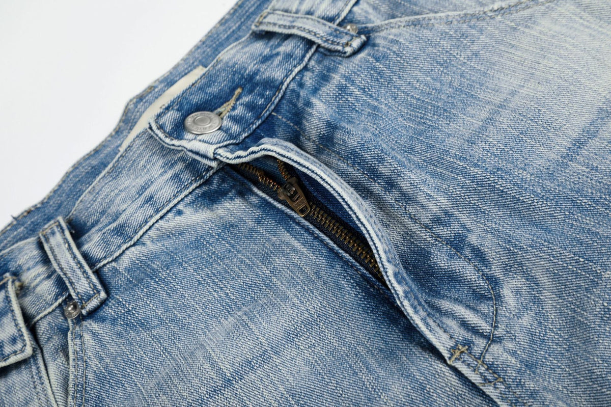 Light Blue Wide-Leg Denim Jeans with Heart Stitching