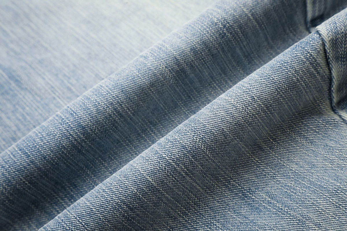 Light Blue Wide-Leg Denim Jeans with Heart Stitching