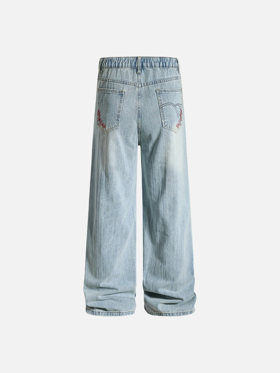 Light Blue Wide-Leg Jeans with Multi-Colored Embroidery