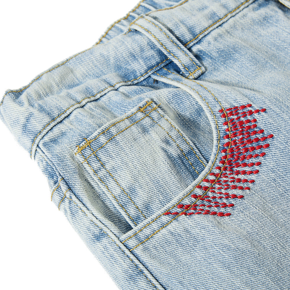 Light Blue Wide-Leg Jeans with Multi-Colored Embroidery