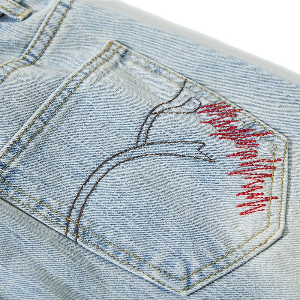 Light Blue Wide-Leg Jeans with Multi-Colored Embroidery