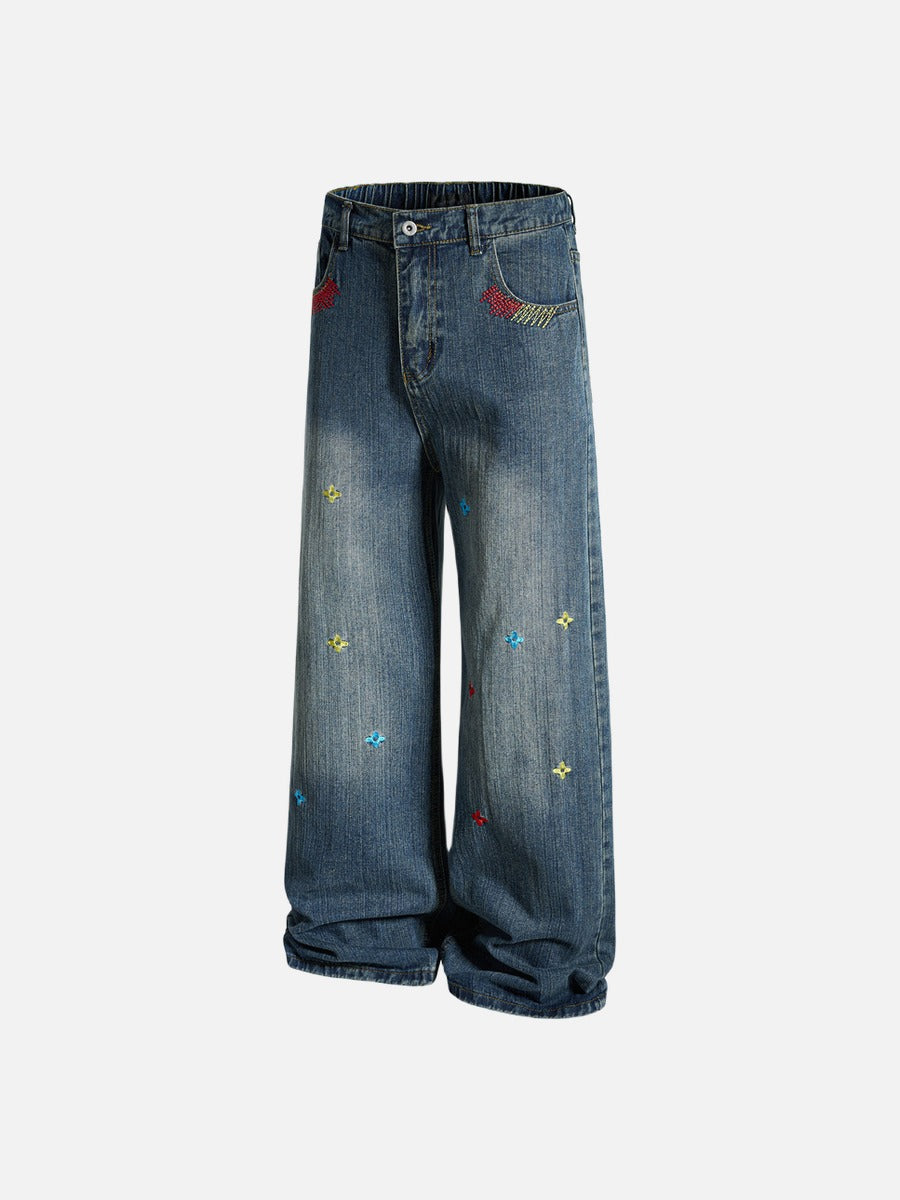 Light Blue Wide-Leg Jeans with Multi-Colored Embroidery