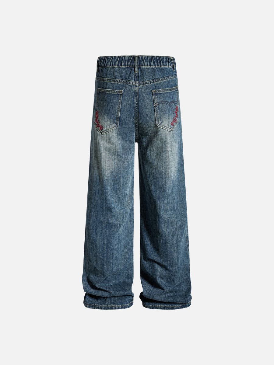 Light Blue Wide-Leg Jeans with Multi-Colored Embroidery