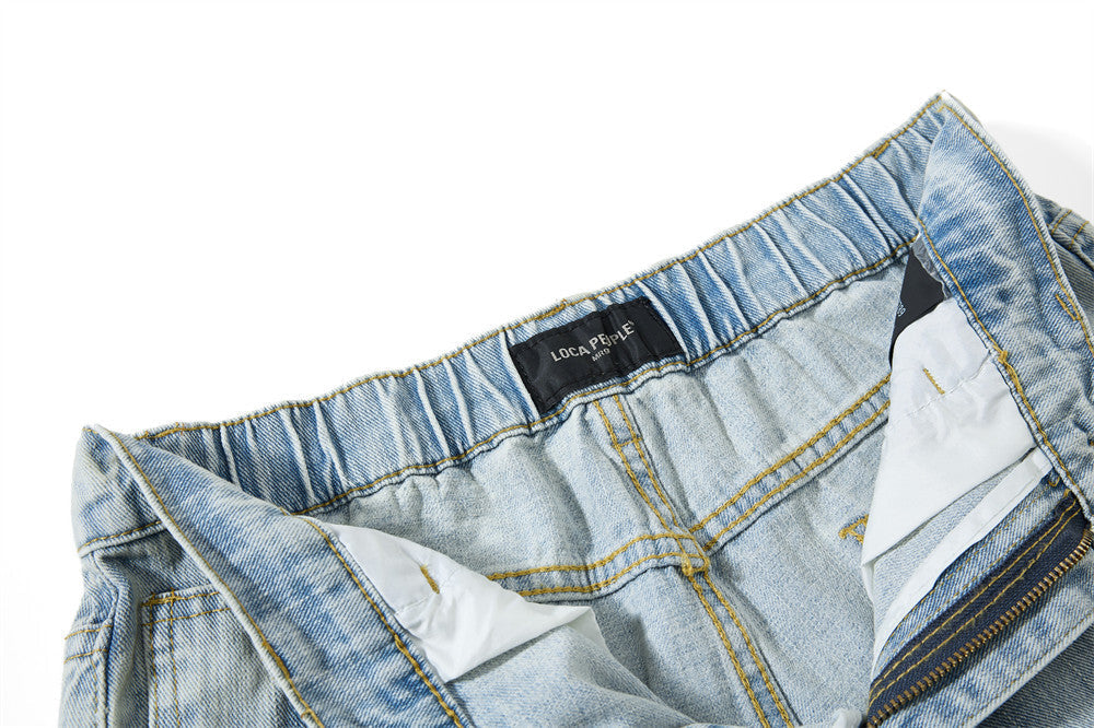 Light Blue Wide-Leg Jeans with Multi-Colored Embroidery