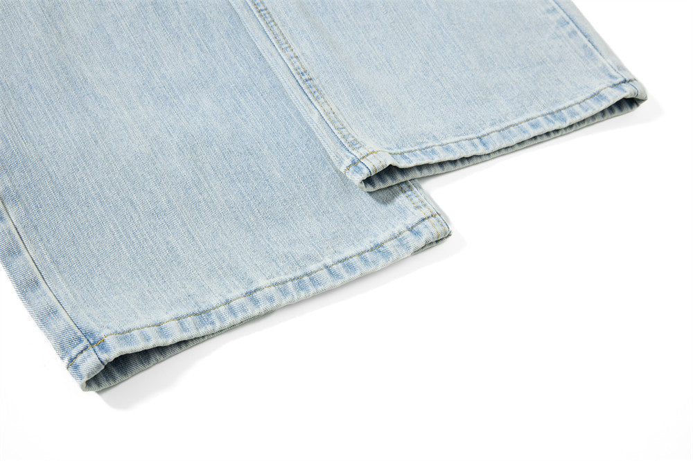 Light Blue Wide-Leg Jeans with Multi-Colored Embroidery