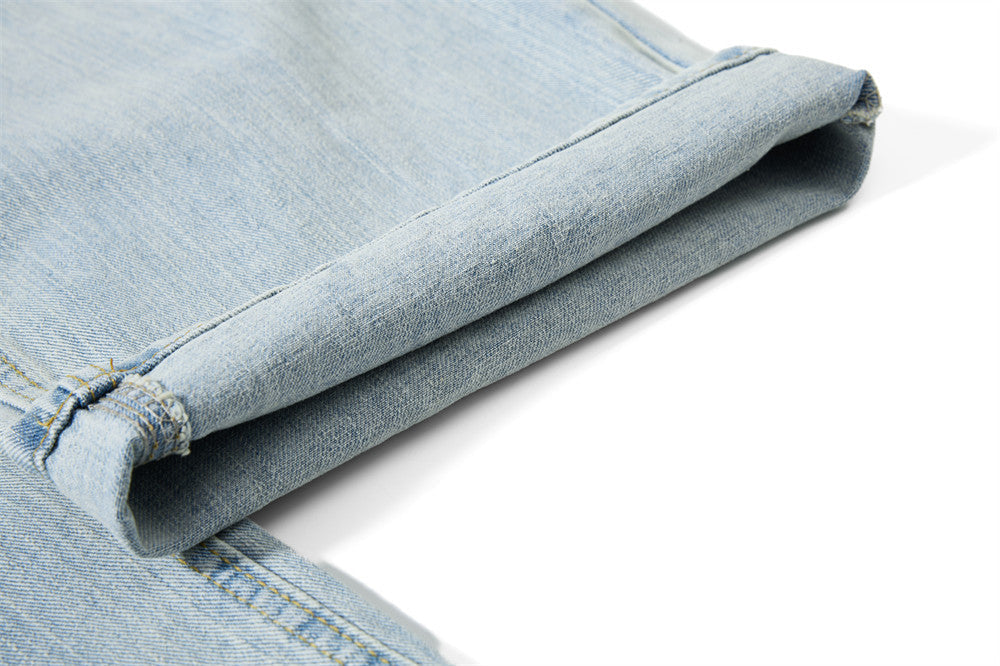 Light Blue Wide-Leg Jeans with Multi-Colored Embroidery