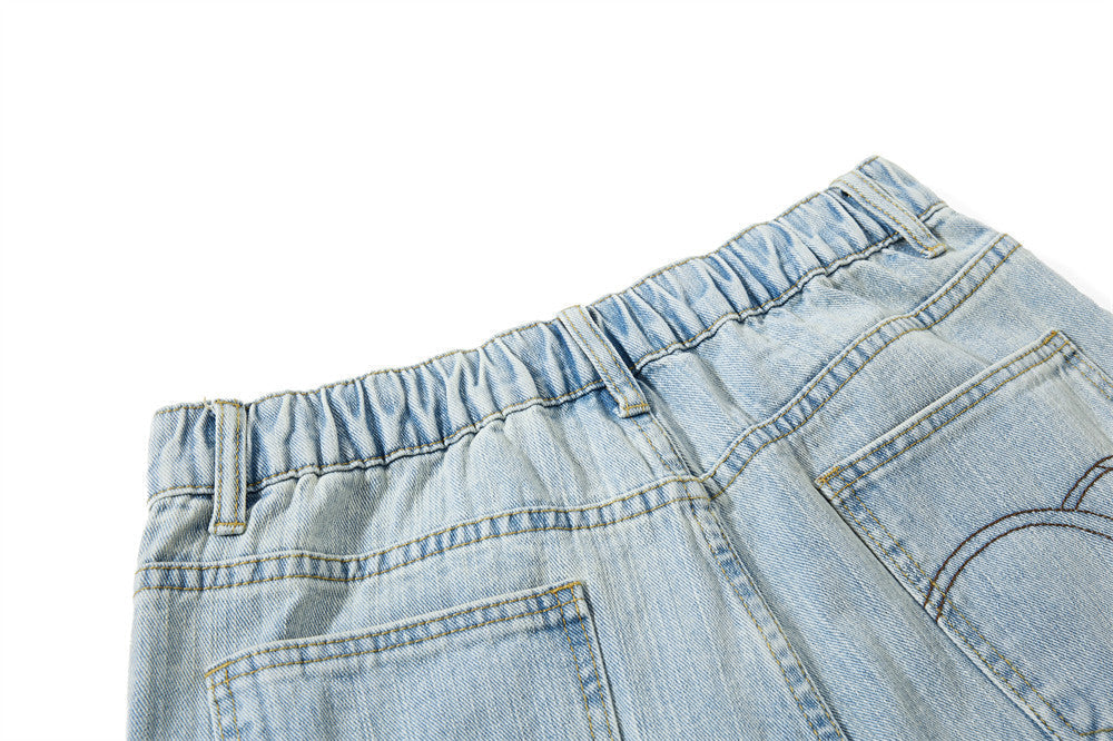 Light Blue Wide-Leg Jeans with Multi-Colored Embroidery