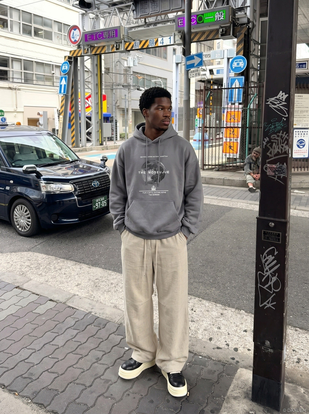 DAXUEN khaki wide-leg drawstring pants — model photo