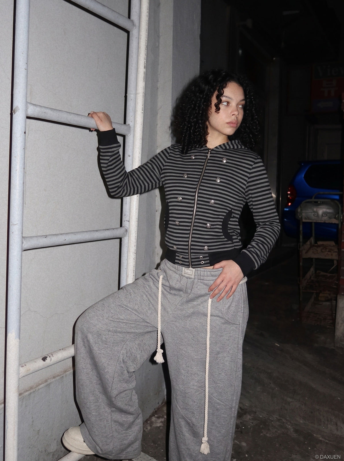 DAXUEN black and grey striped metallic-studded zip-up hoodie — model photo