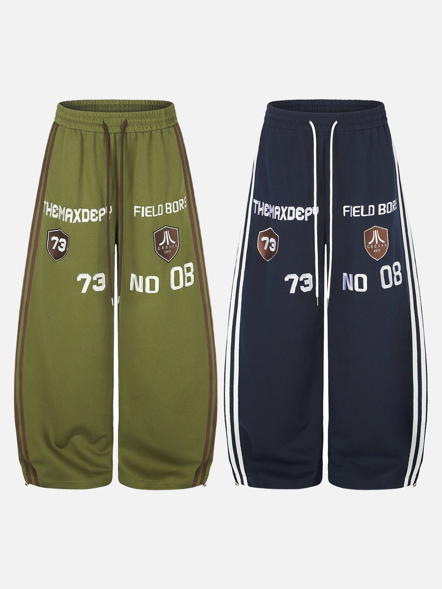 Olive Green Balloon Track Pants with Bold Graphics