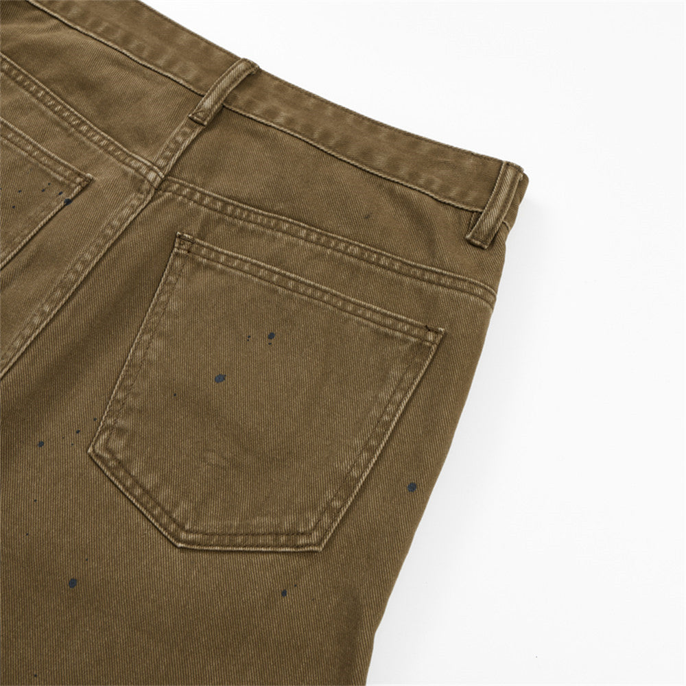 Paint-Splatter Flared Jeans with Star Studs