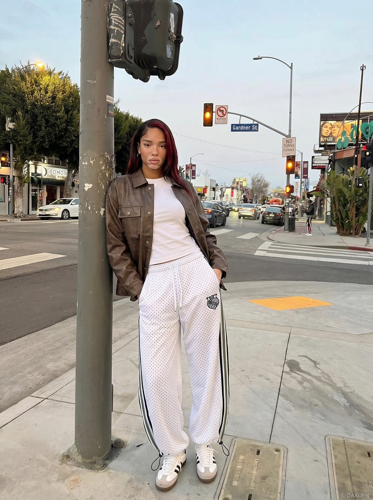 DAXUEN Wide leg polka dot trousers with stripes — model photo