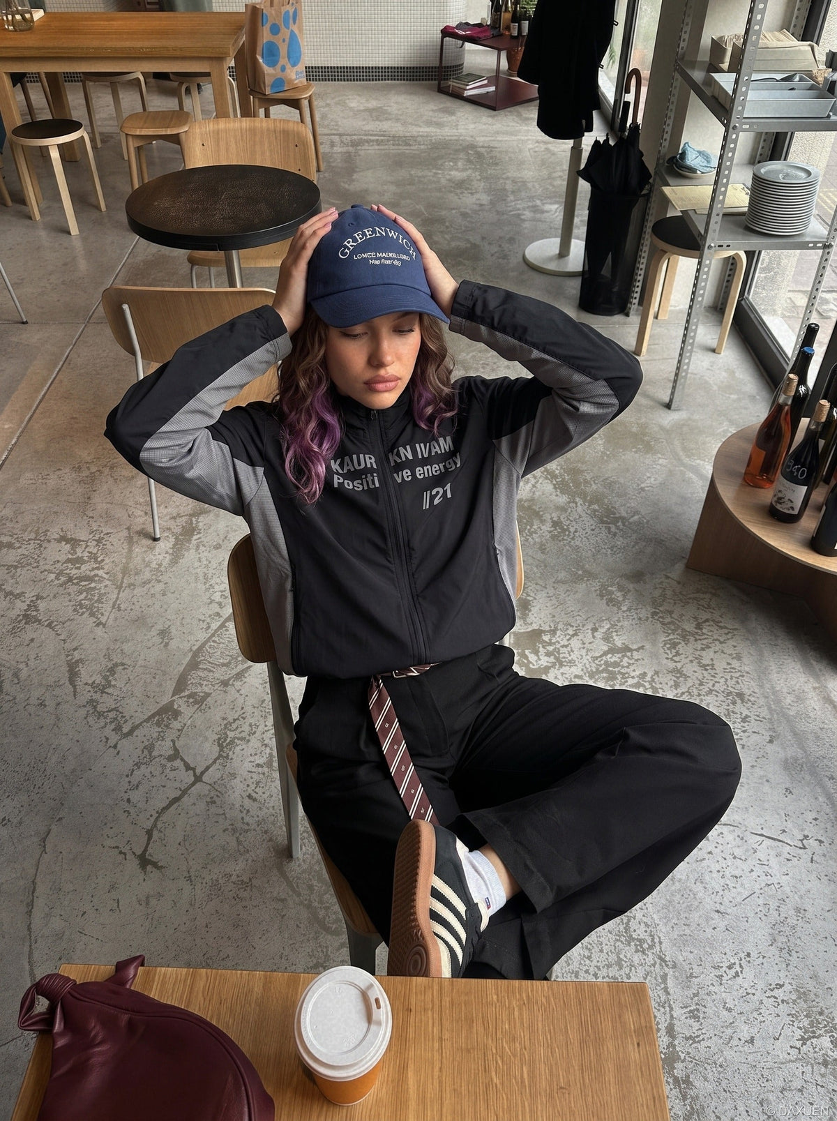 DAXUEN black reflective text graphic stand-collar jacket — model photo
