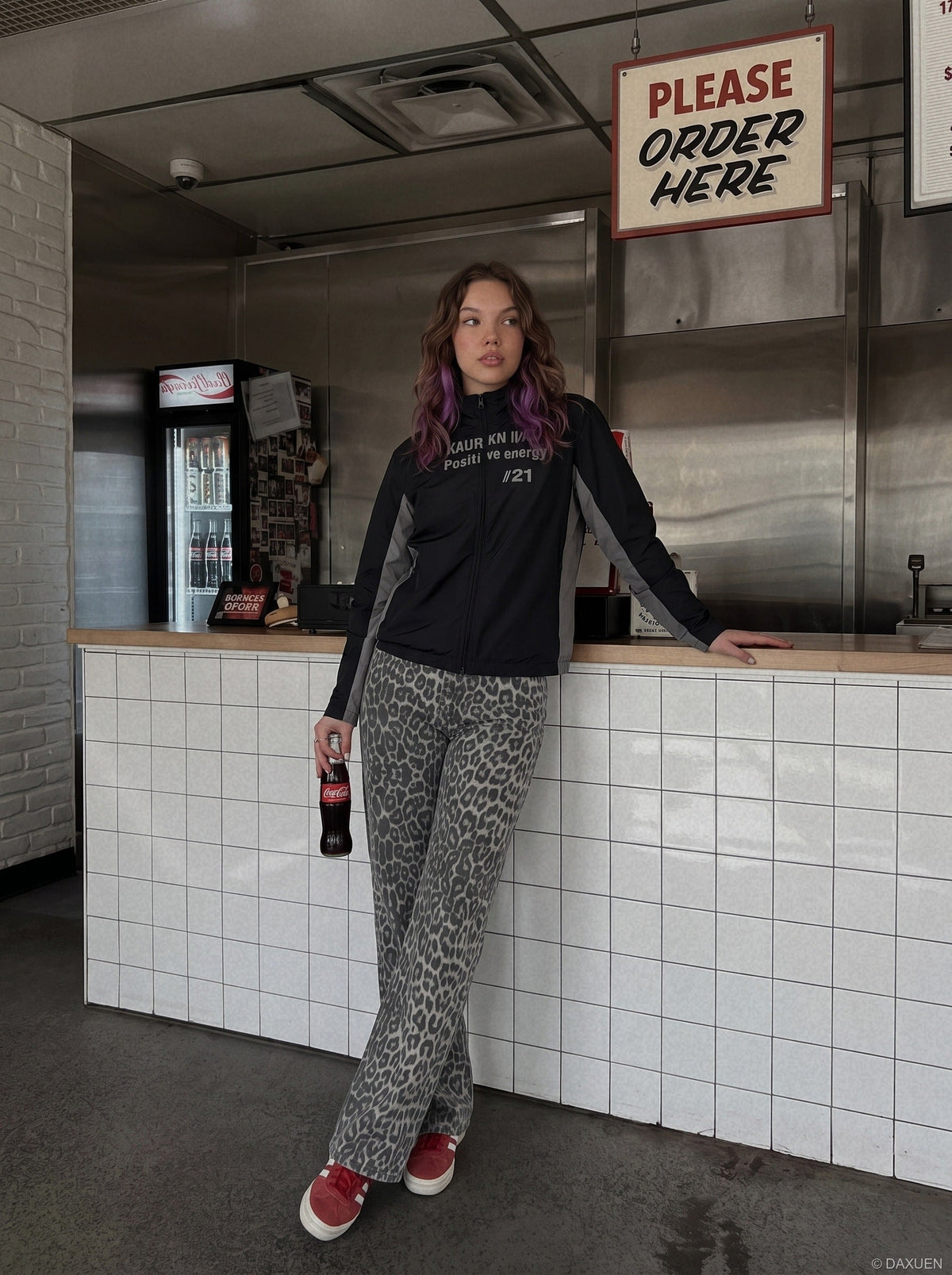 DAXUEN black reflective text graphic stand-collar jacket — model photo