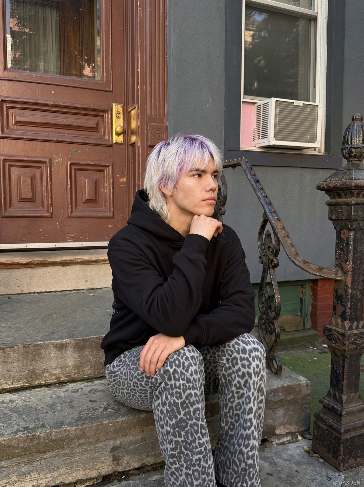 DAXUEN black oversized script-embroidered hoodie — model photo