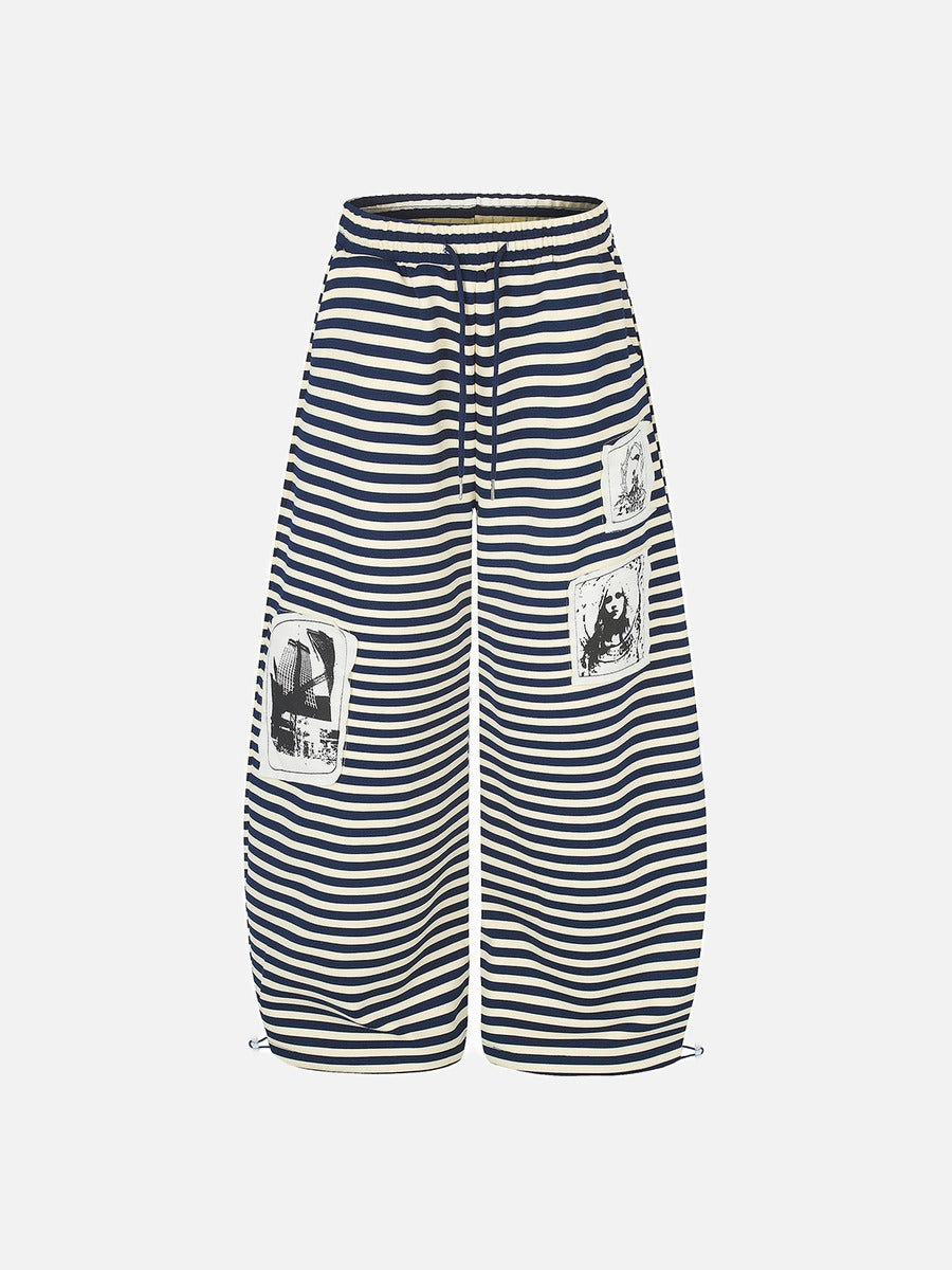 DAXUEN striped wide-leg pants with skull and structure patches