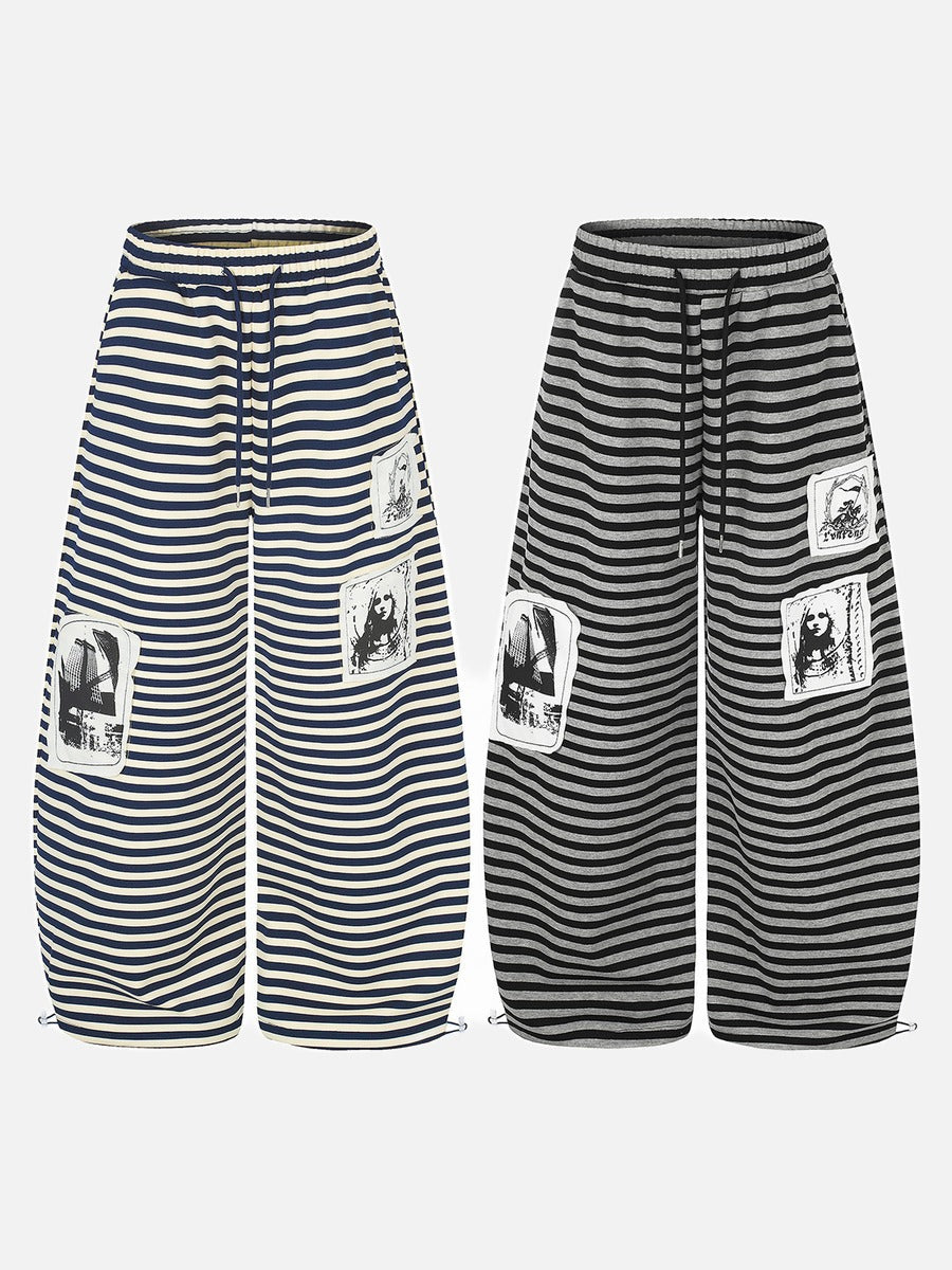 DAXUEN striped wide-leg pants with skull and structure patches