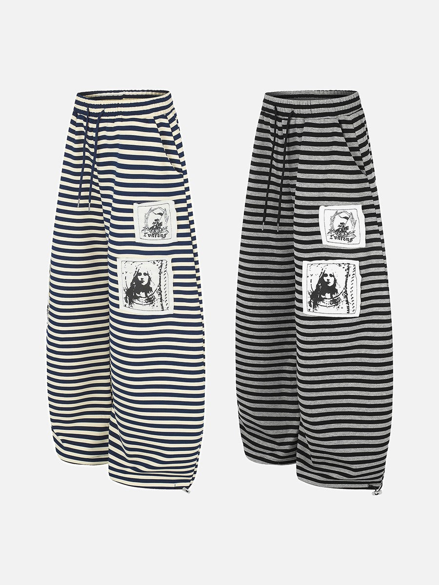DAXUEN striped wide-leg pants with skull and structure patches
