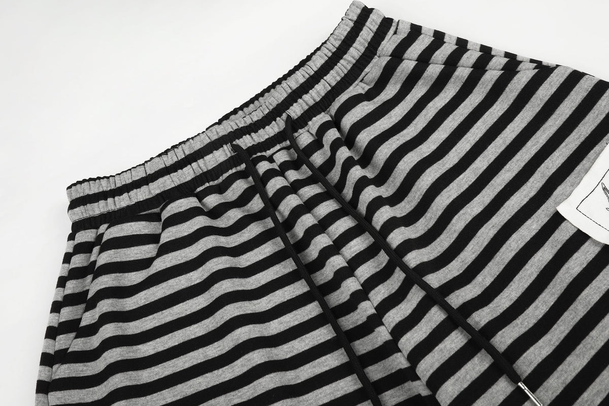 DAXUEN striped wide-leg pants with skull and structure patches