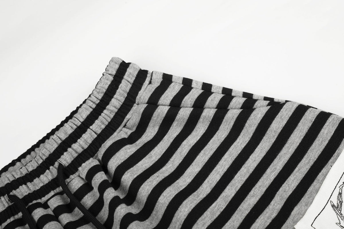 DAXUEN striped wide-leg pants with skull and structure patches