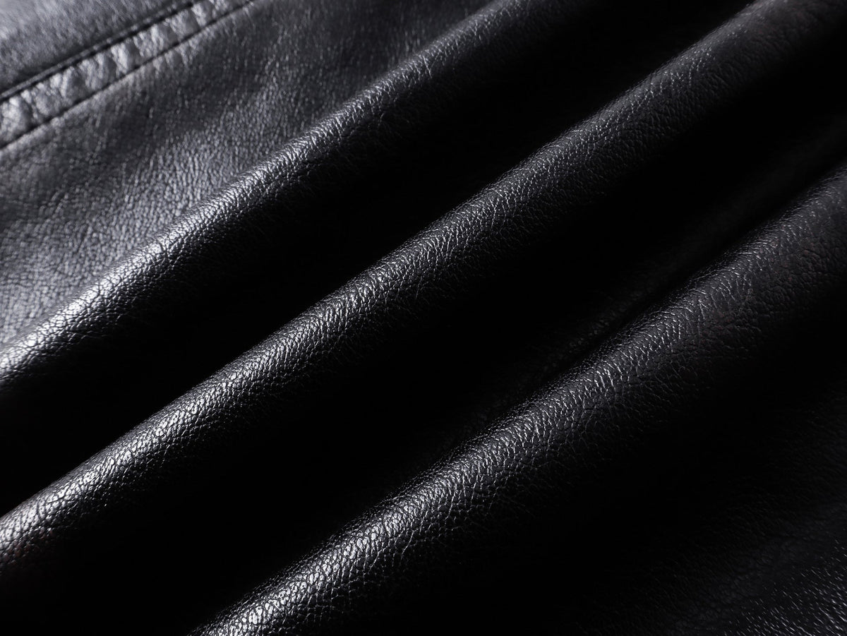 DAXUEN black leather-look jacket with zippered details