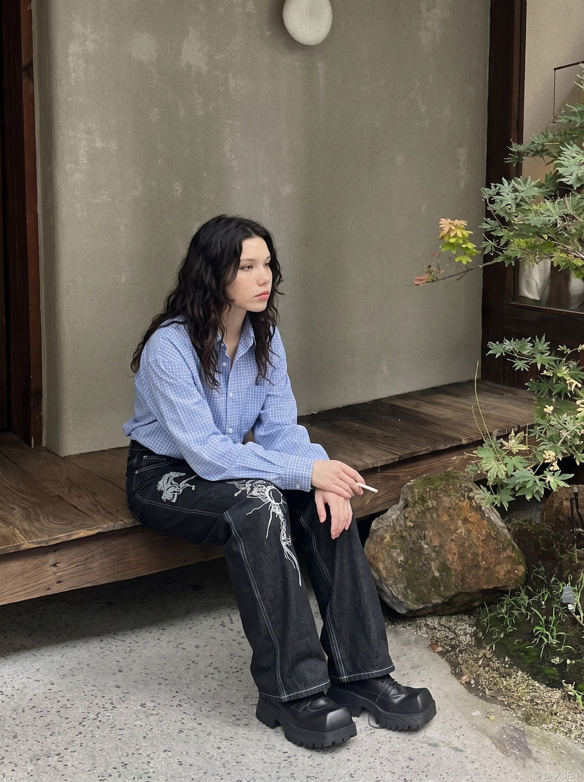 DAXUEN dark wash wide-leg jeans with white animal graphic — model photo