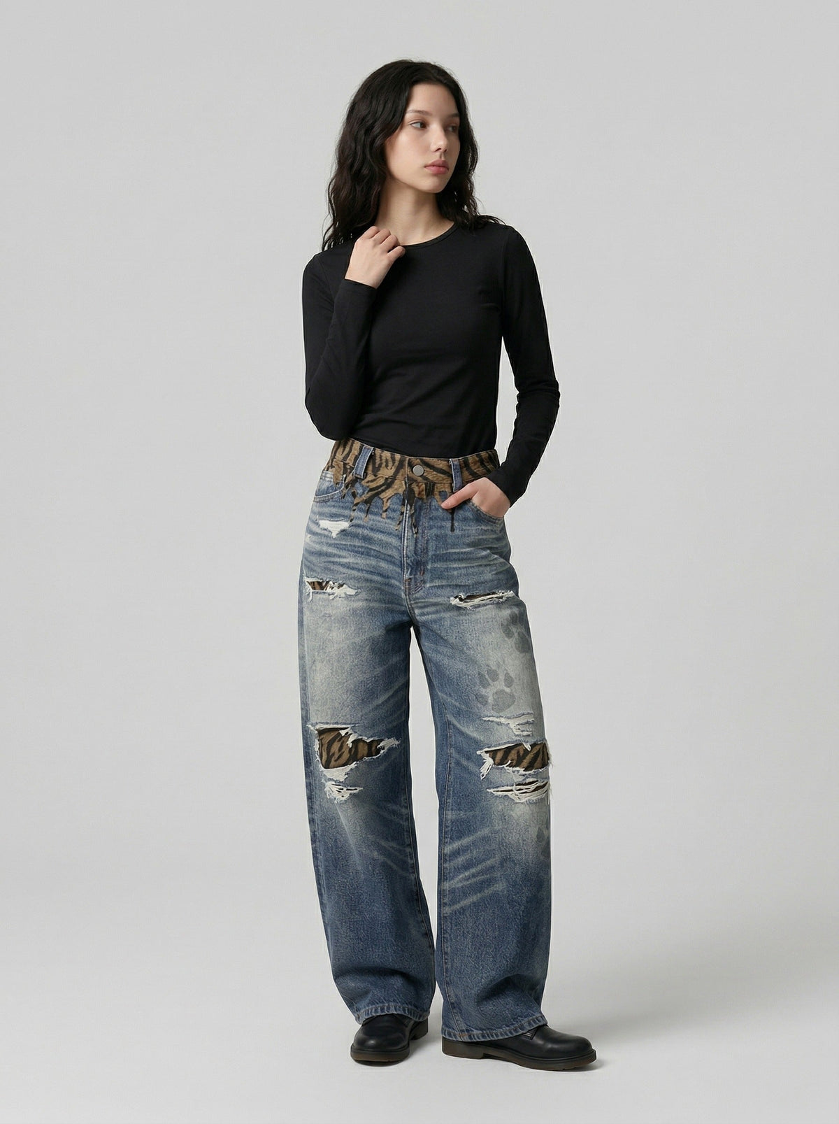 DAXUEN Distressed wide-leg jeans with tiger stripe pattern — model photo