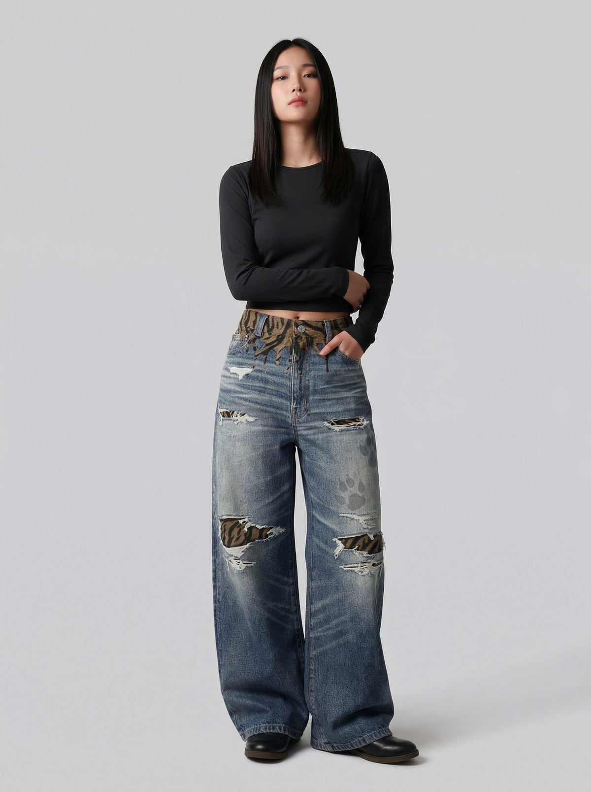 DAXUEN Distressed wide-leg jeans with tiger stripe pattern — model photo