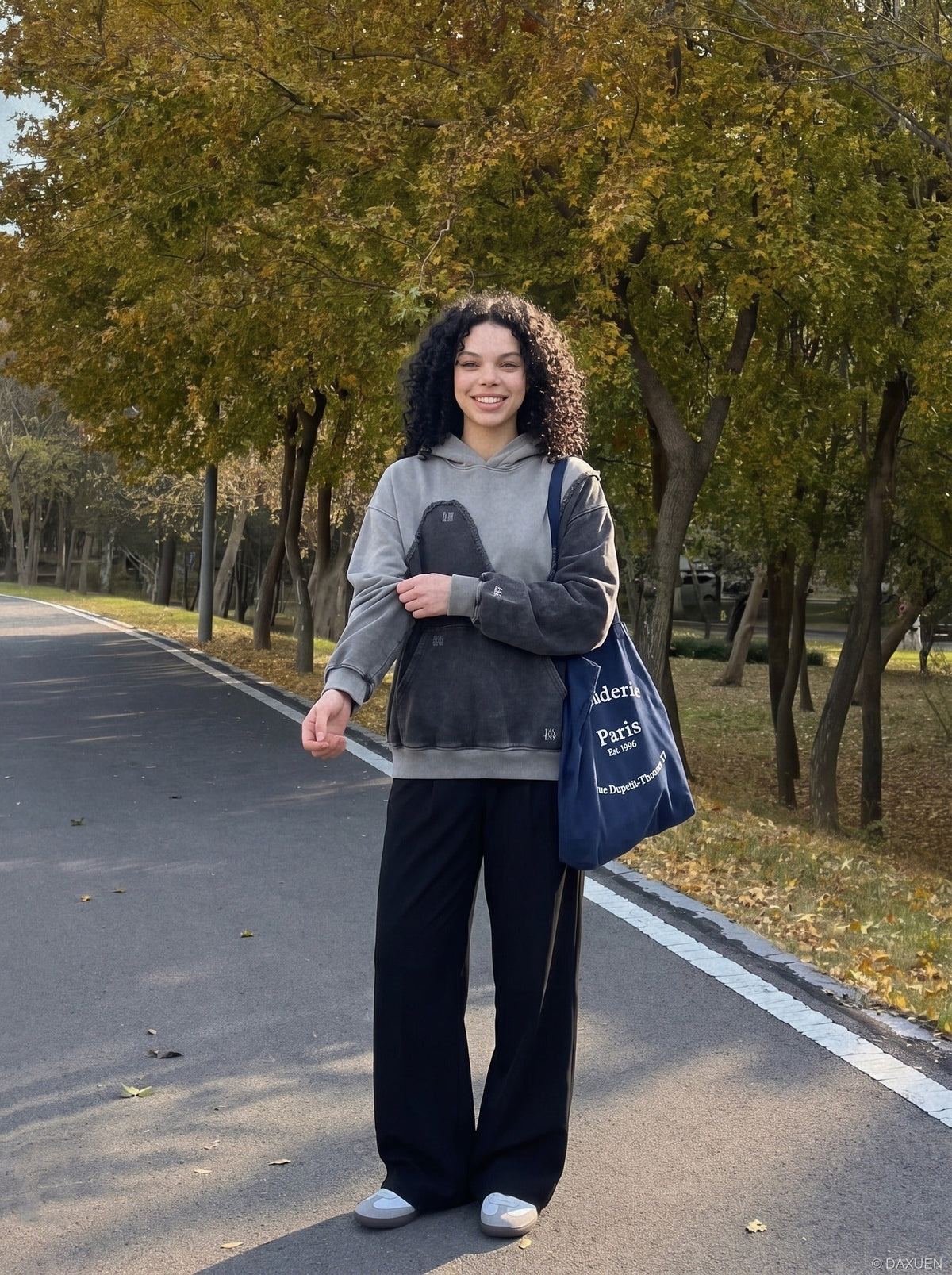 DAXUEN grey and charcoal two-tone acid-wash oversized hoodie — model photo