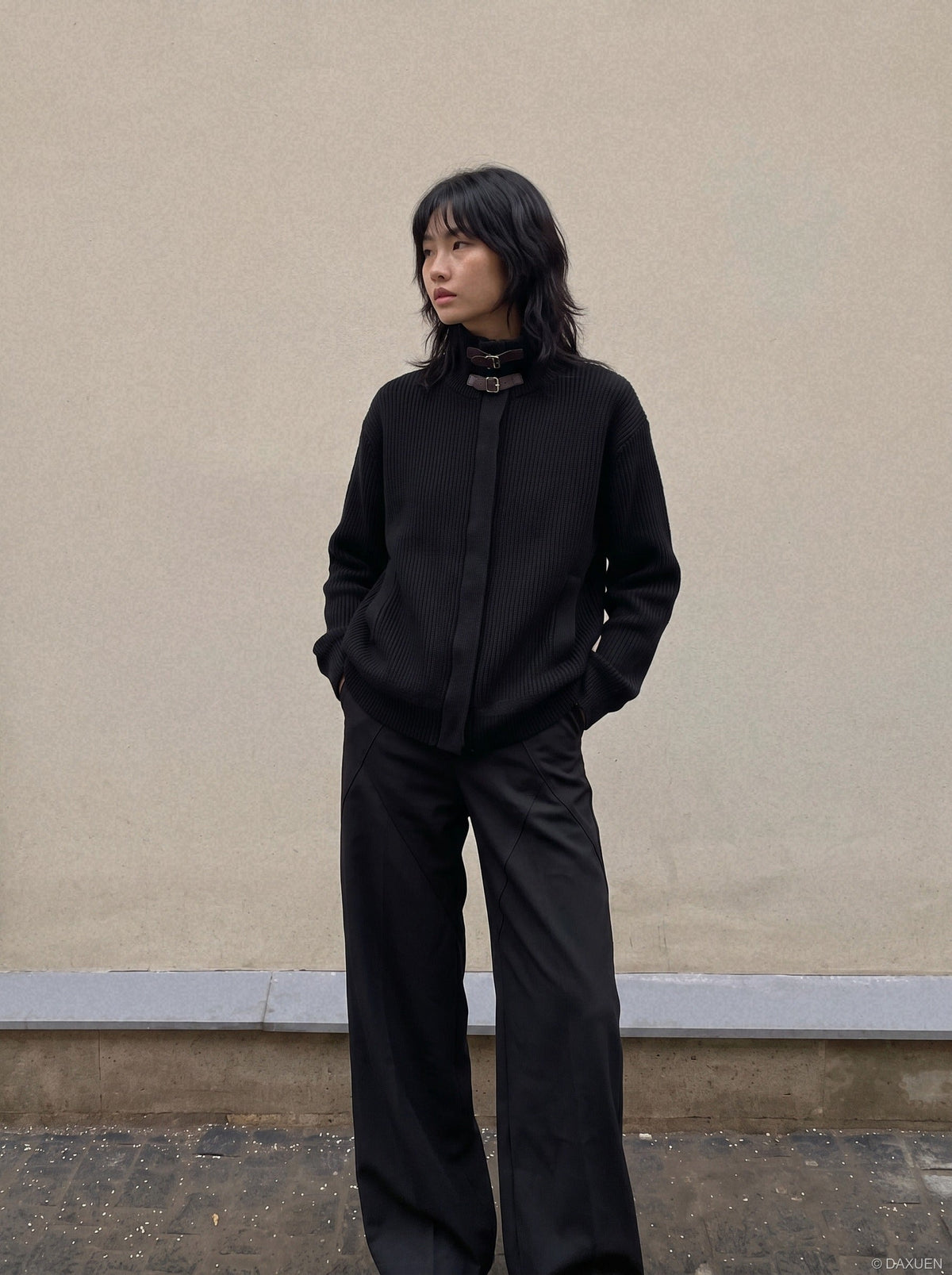 DAXUEN black vertical ribbed mock neck jacket — model photo