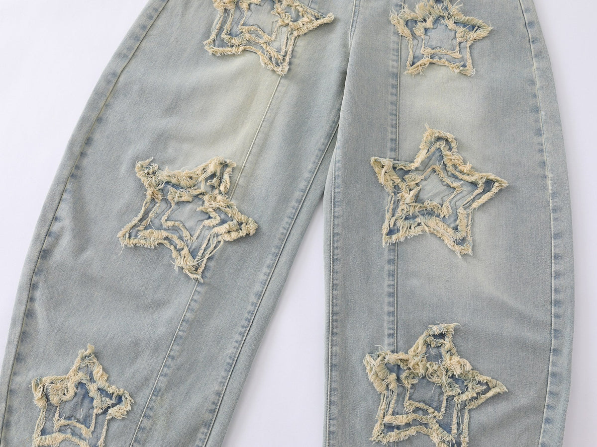 Jeans de pierna ancha con efecto desgastado y estrellas de Madxmarx