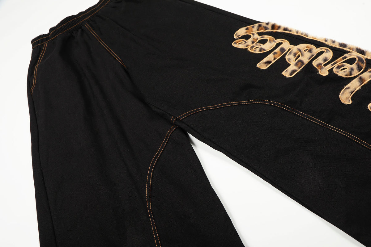 Pantalon large à patch léopard Madxmarx