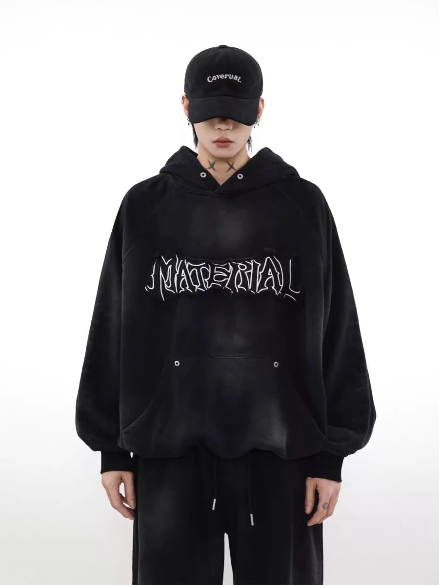 Sudadera con capucha bordada y estampado "Material"