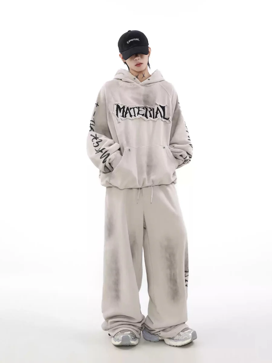 Sudadera con capucha bordada y estampado "Material"